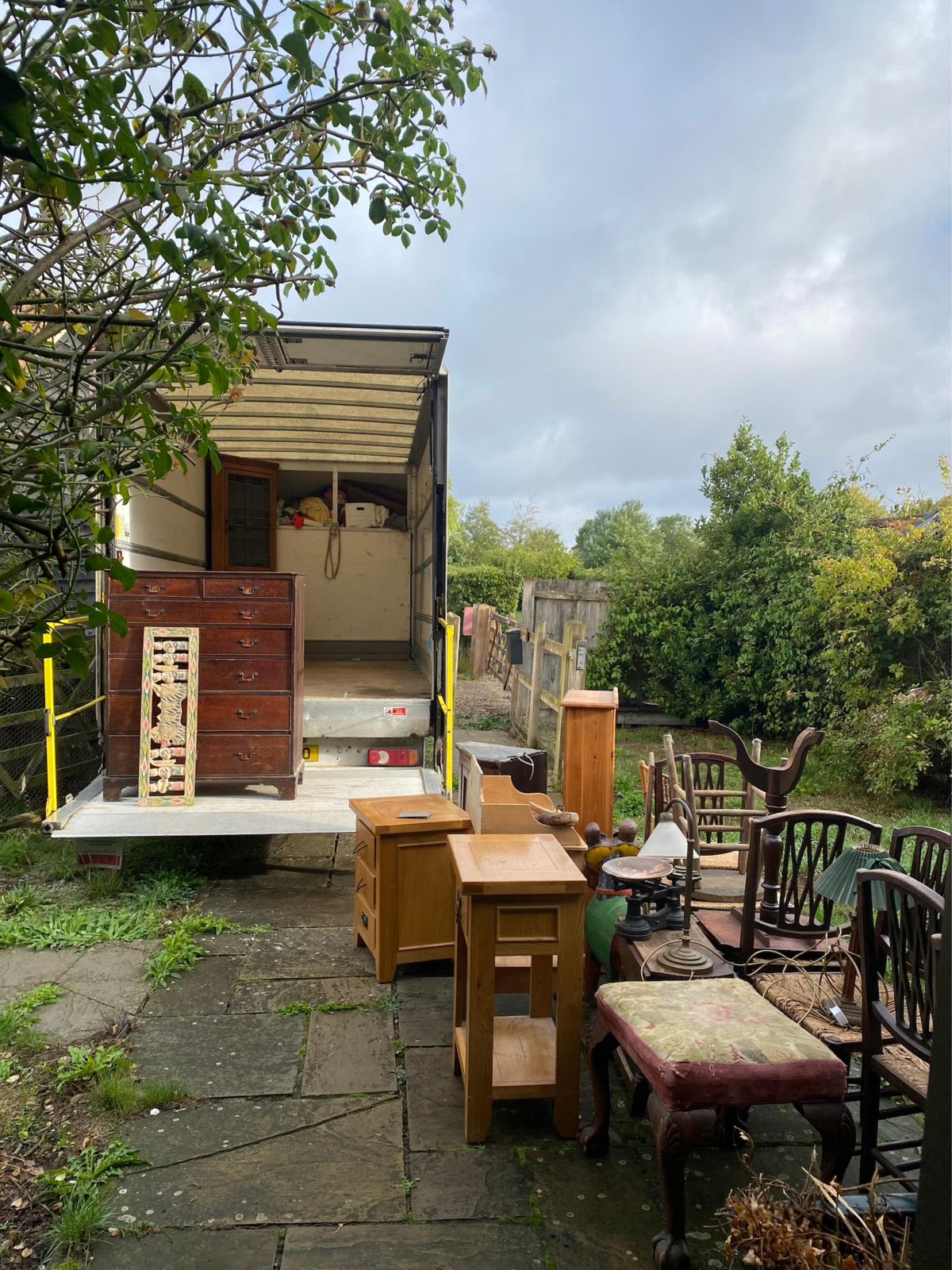 Furniture brought out ready for loading during a house clearance